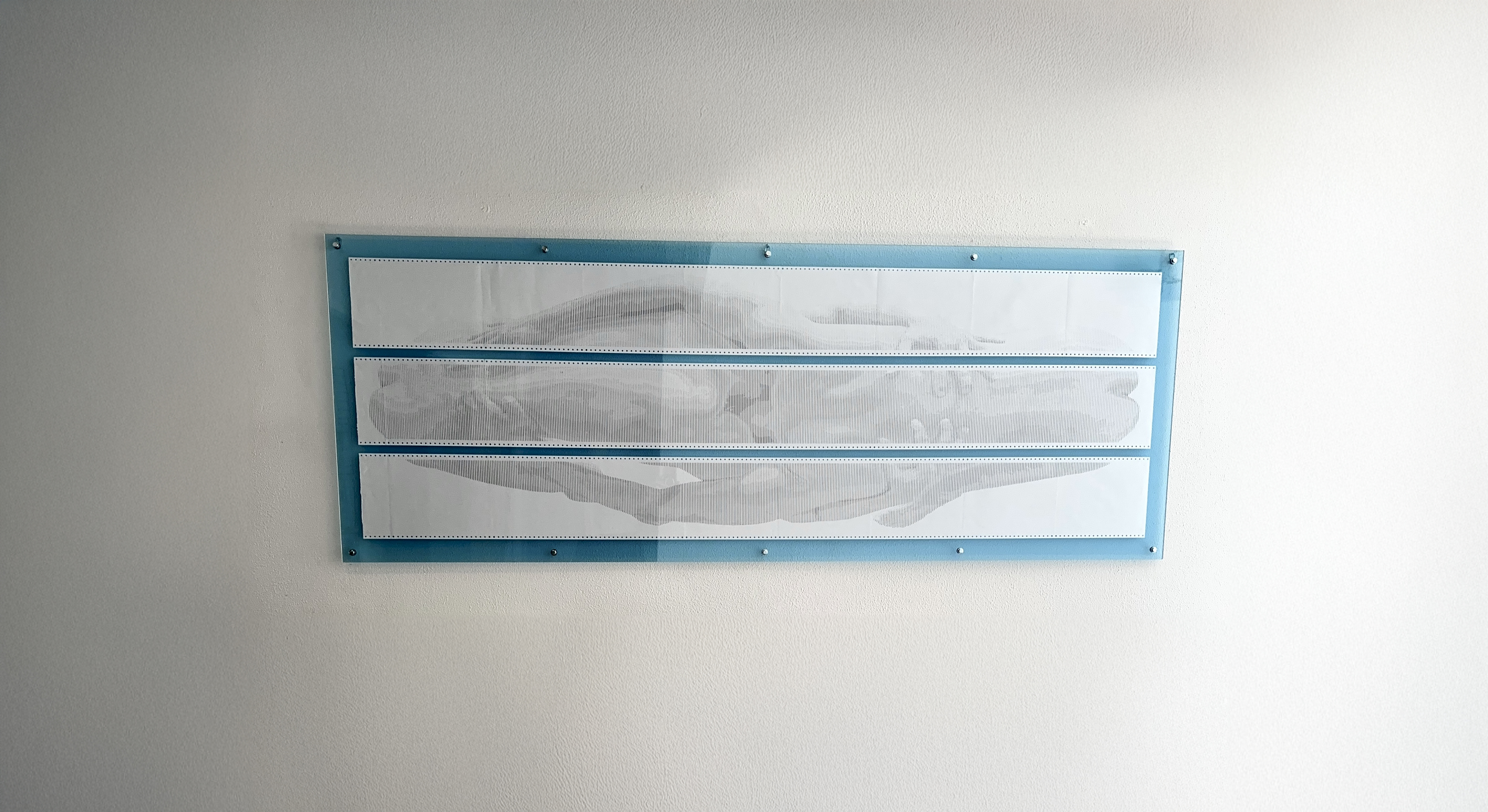 BODY.QUEUE by CHARACTERS installed on a white wall, three vertical paper panels forming a contemporary homoerotic artwork.